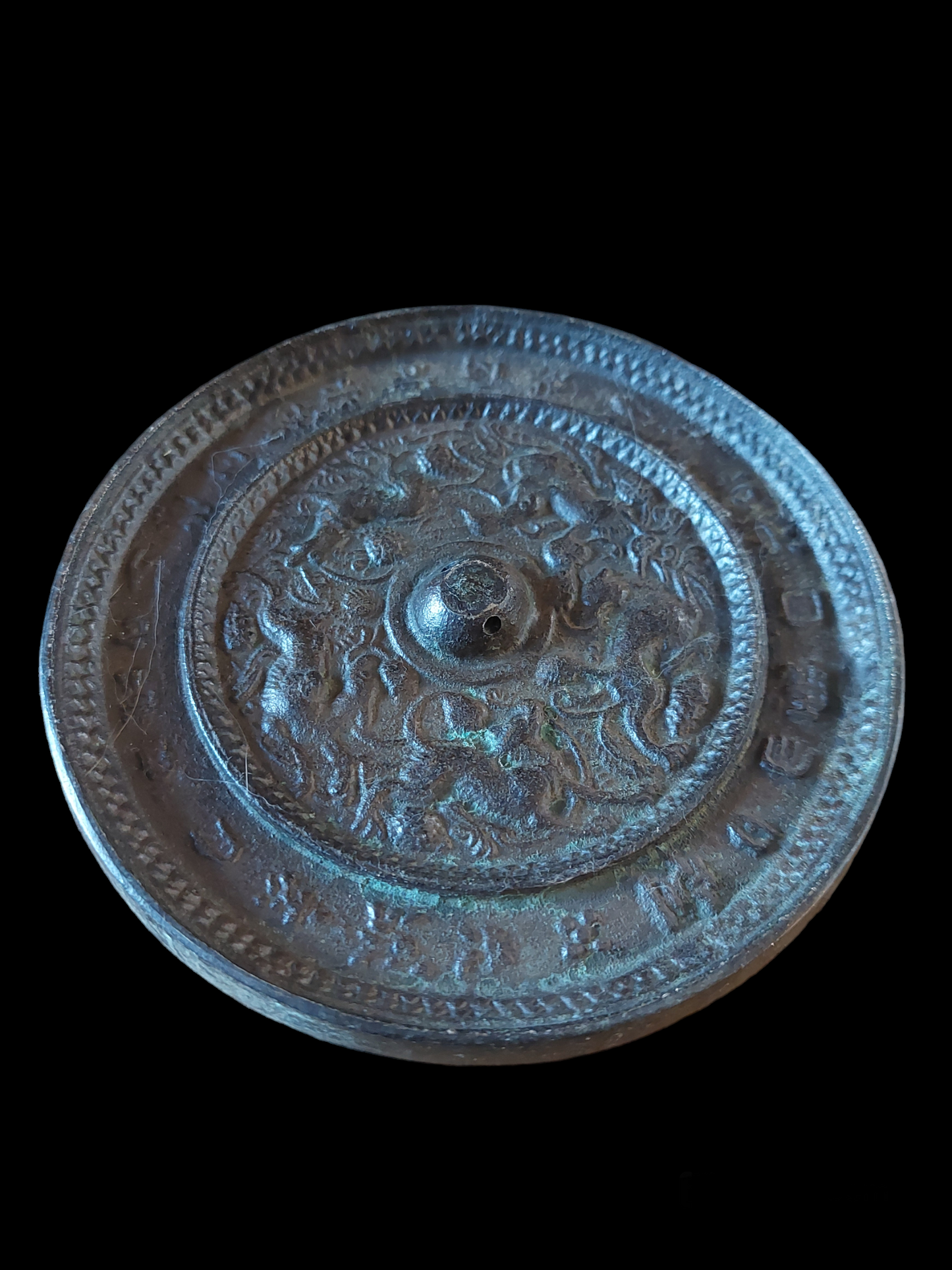 Antique Chinese bronze shamanic mirror Sea Beasts and Grapes 120 millimeter