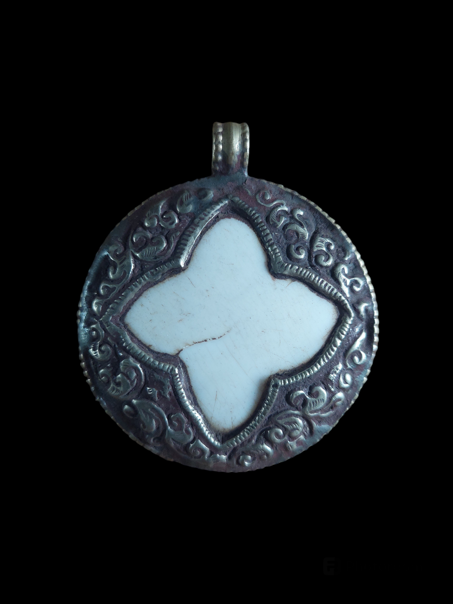 Vintage Tibetan silver and conch shell pendant