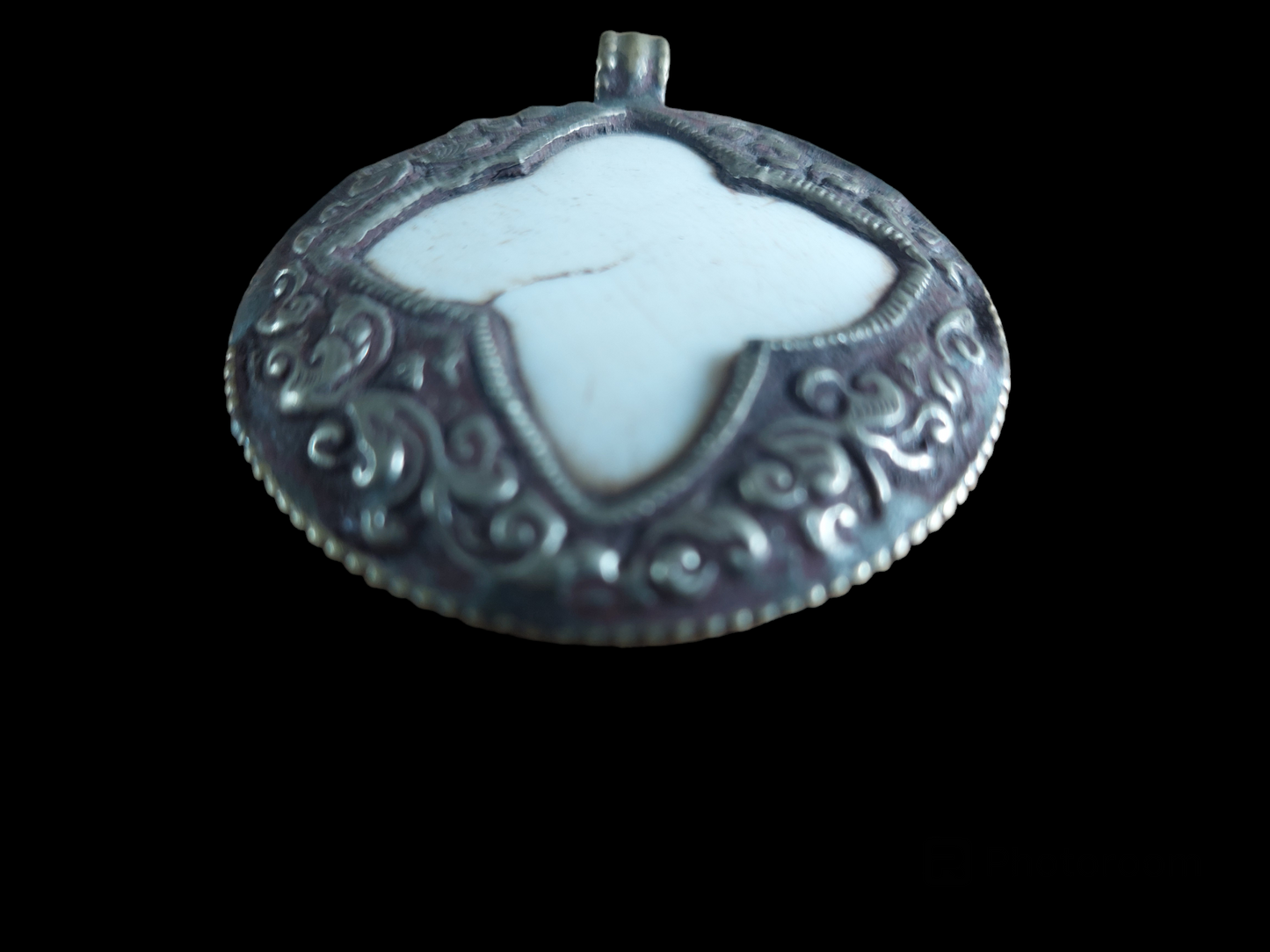 Vintage Tibetan silver and conch shell pendant