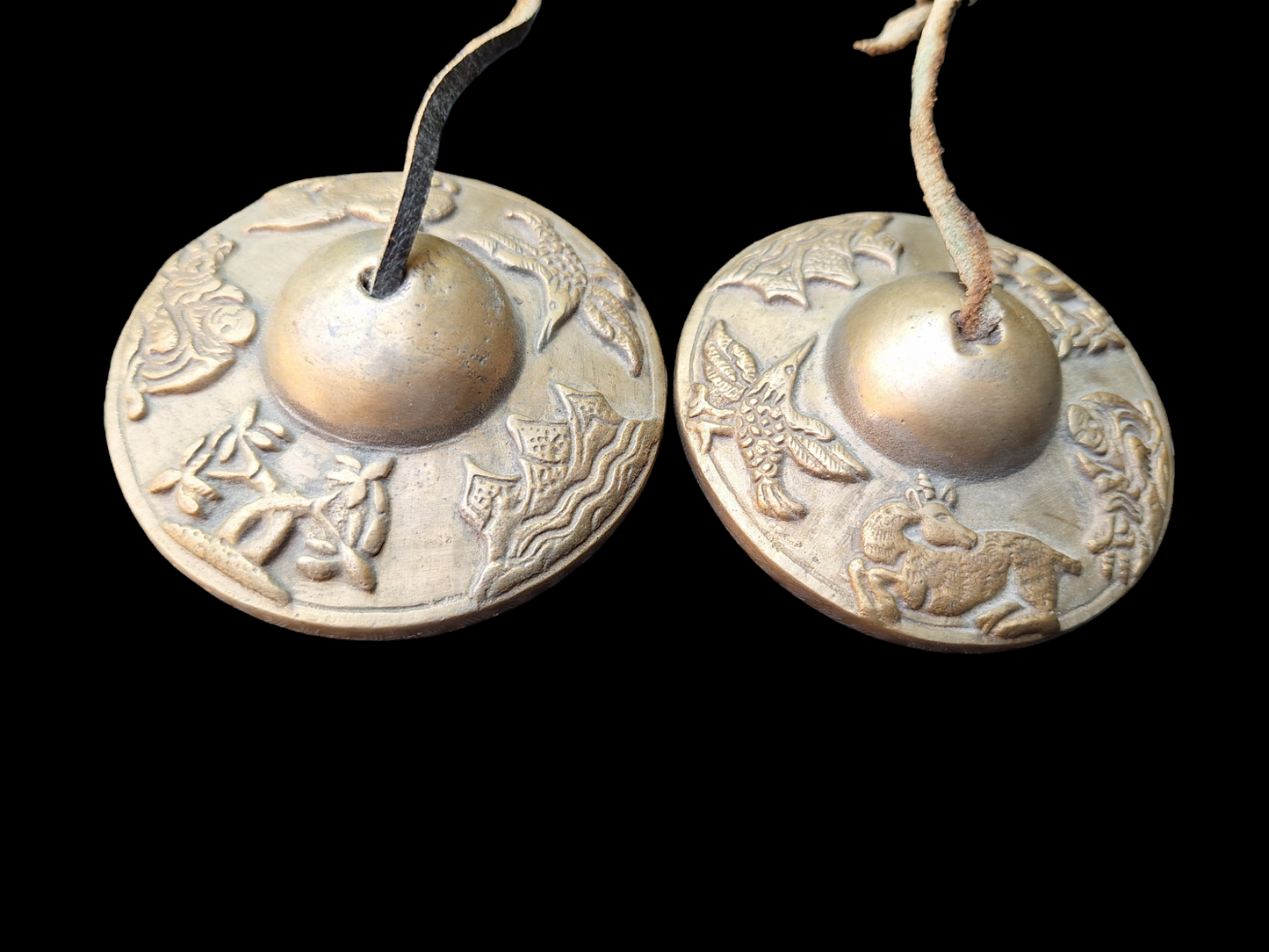 Vintage tingsha bells with buddhist symbols