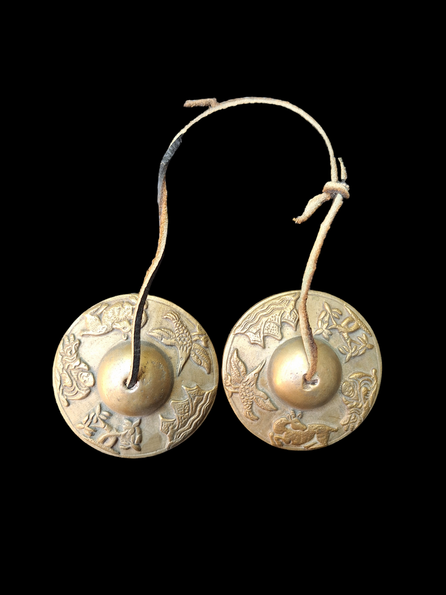 Vintage tingsha bells with buddhist symbols