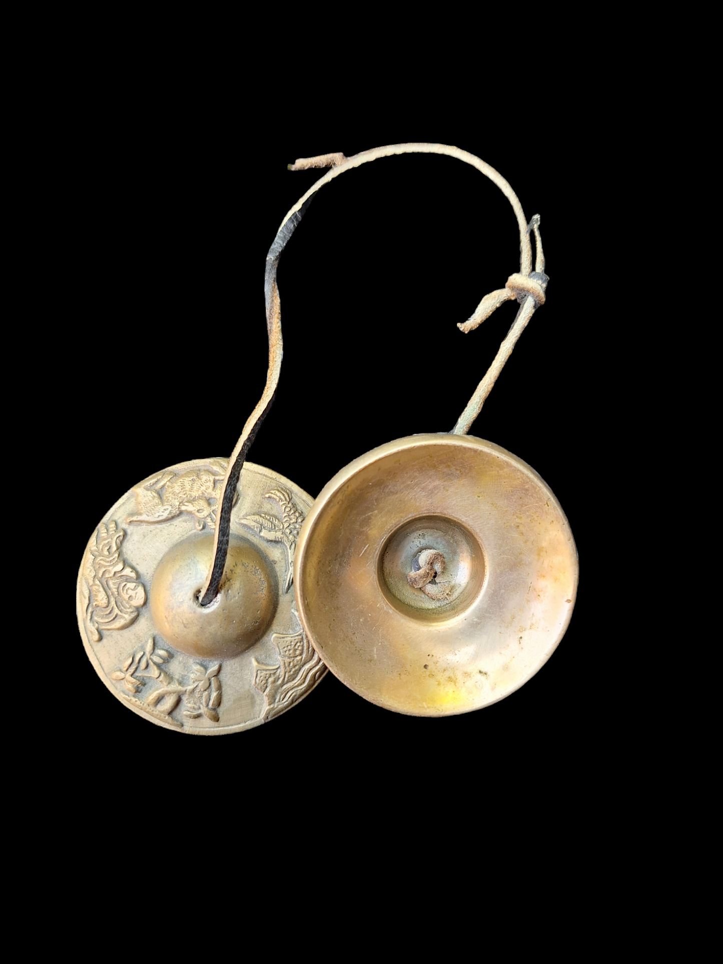 Vintage tingsha bells with buddhist symbols