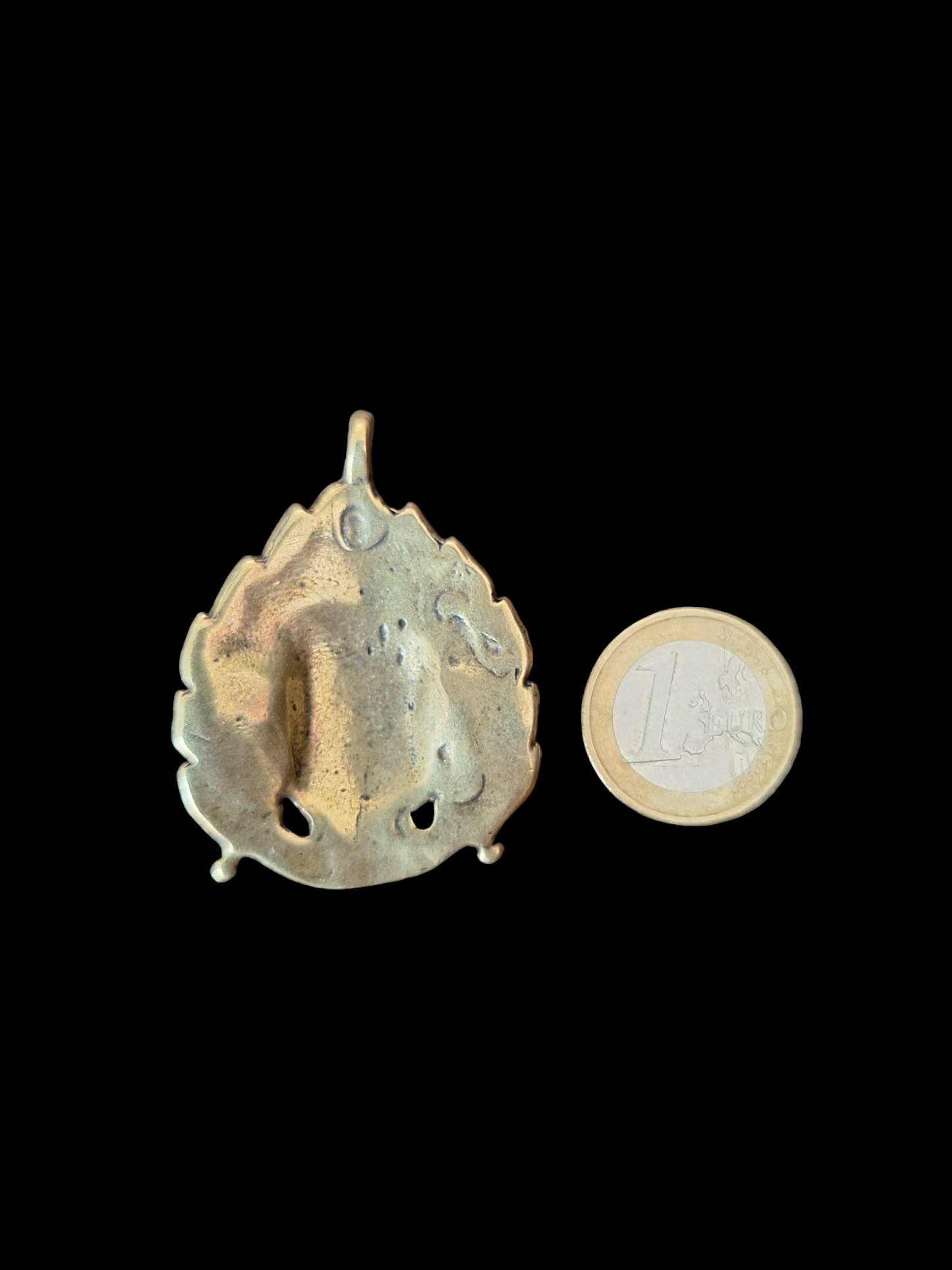 Angry deity pendant #1