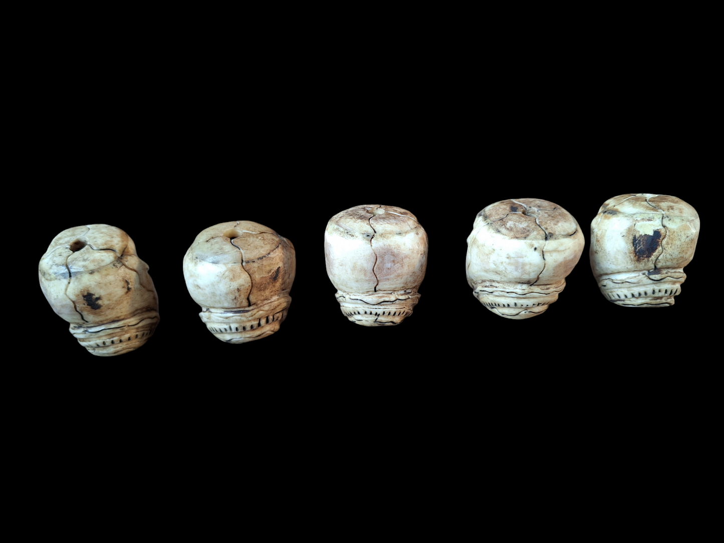 Yak bone skull beads