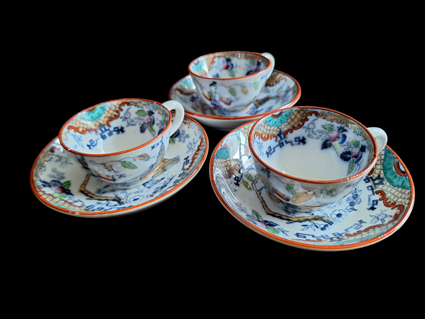 Antique Dutch lusterware cups and saucers, set of 3