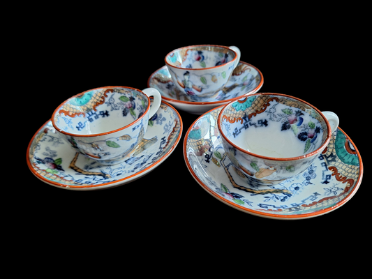 Antique Dutch lusterware cups and saucers, set of 3