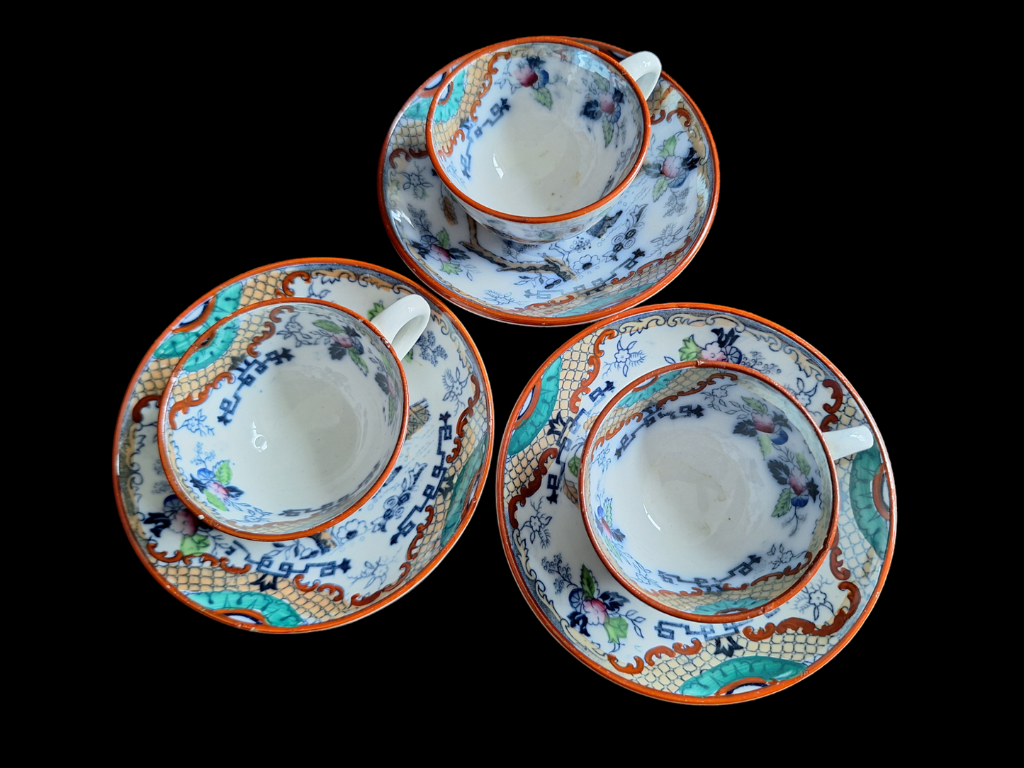 Antique Dutch lusterware cups and saucers, set of 3