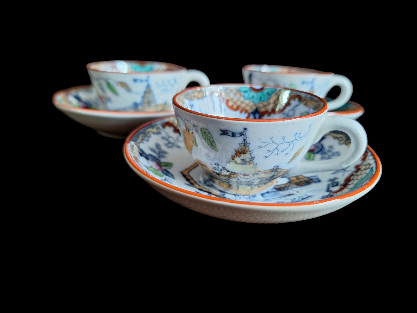 Antique Dutch lusterware cups and saucers, set of 3