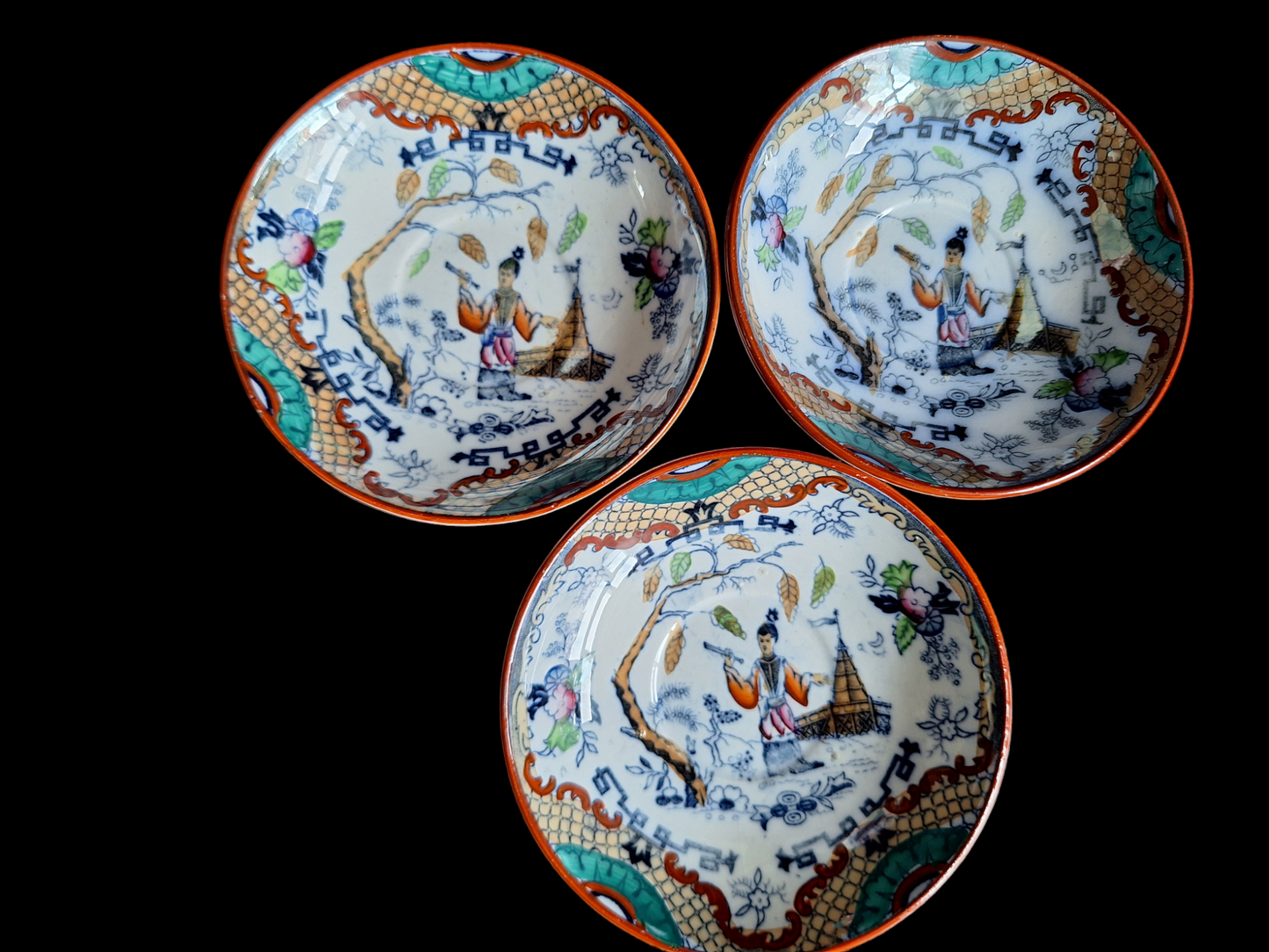 Antique Dutch lusterware cups and saucers, set of 3