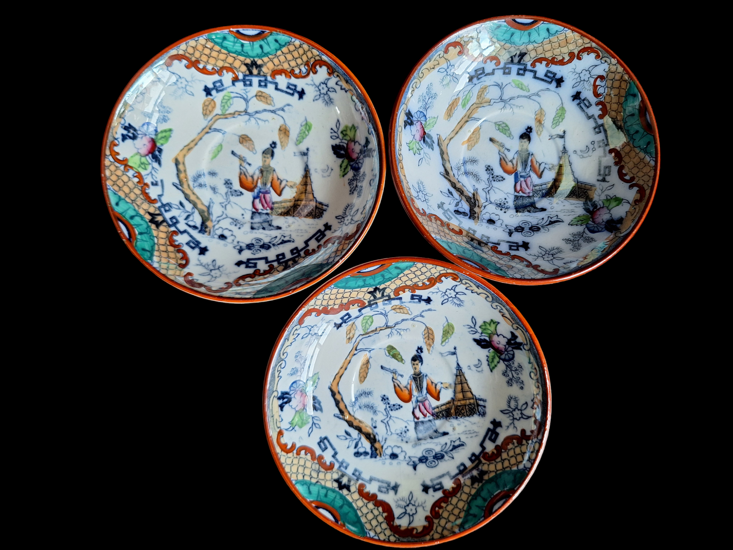 Antique Dutch lusterware cups and saucers, set of 3