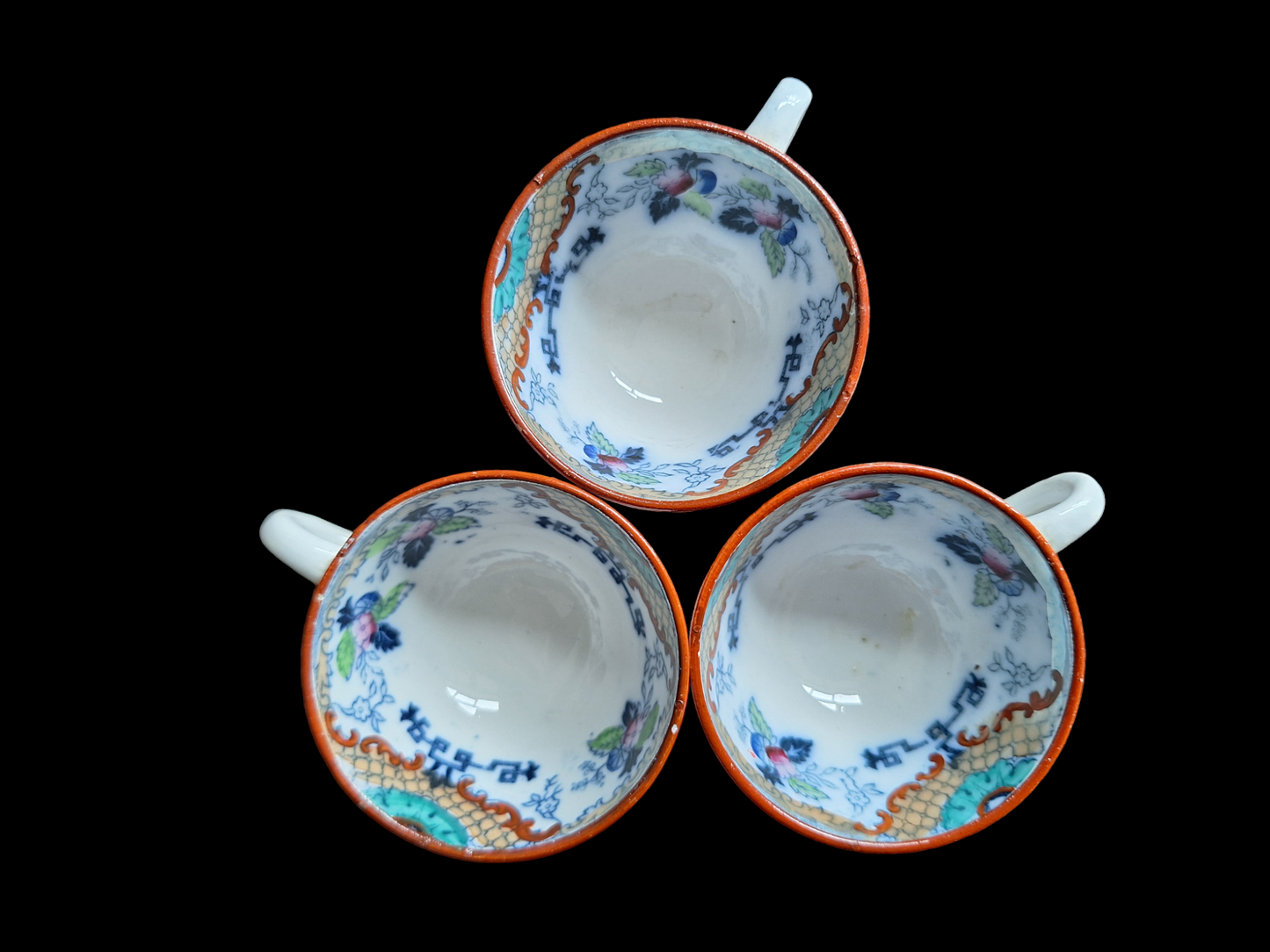 Antique Dutch lusterware cups and saucers, set of 3