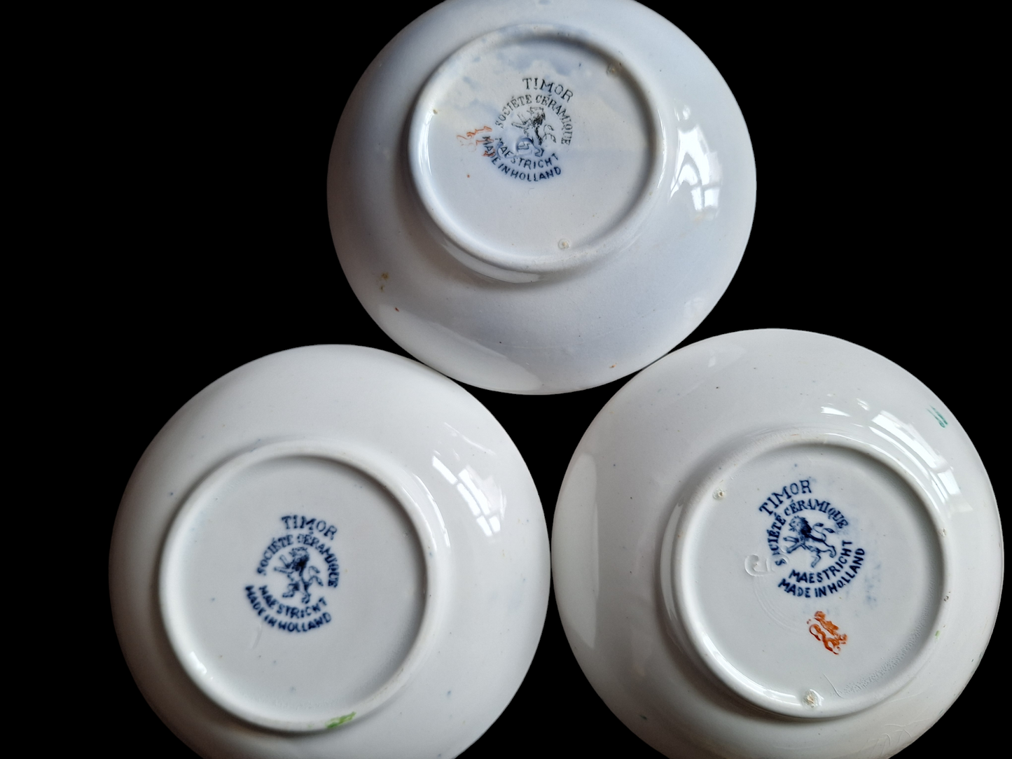Antique Dutch lusterware cups and saucers, set of 3
