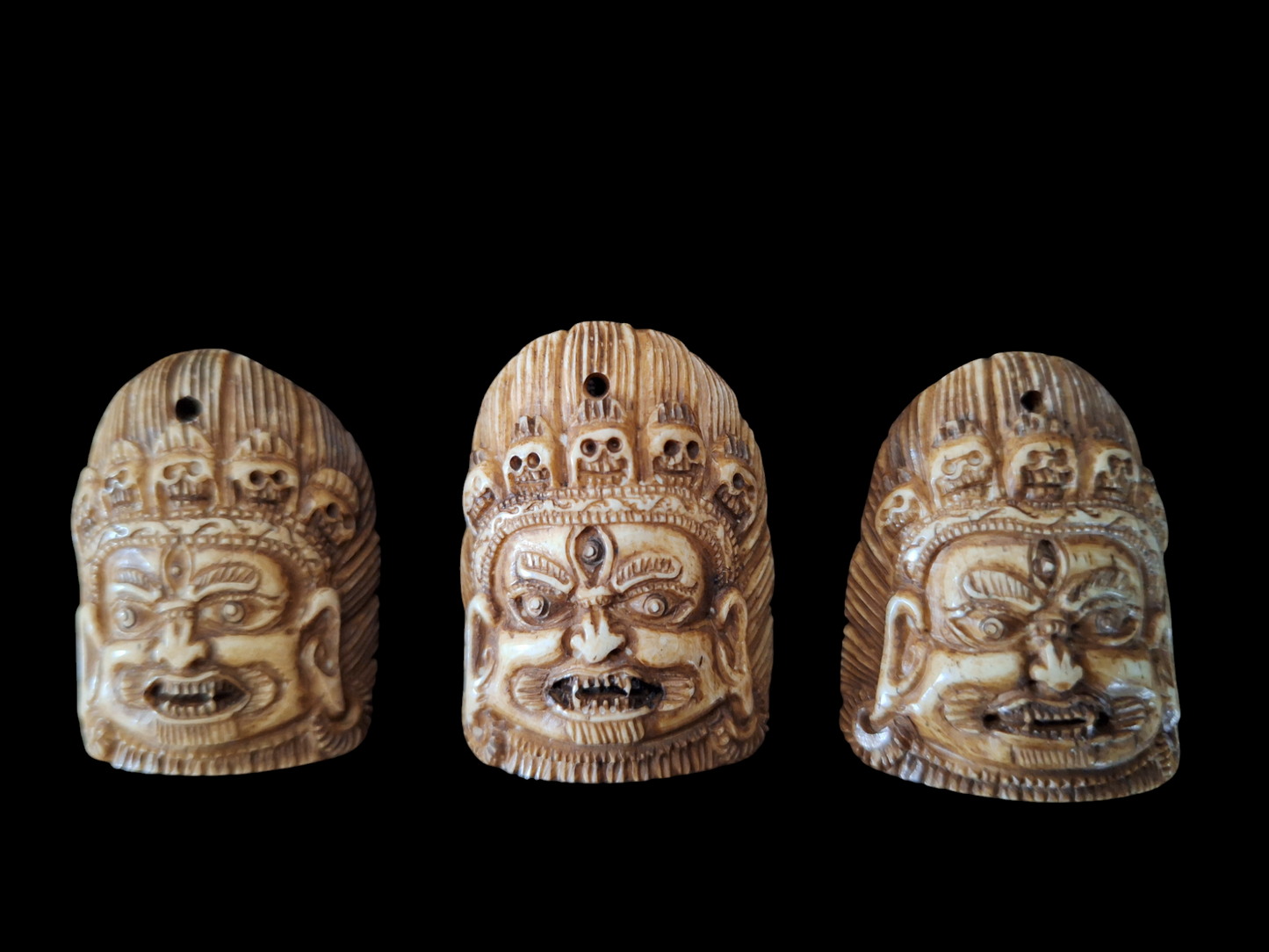 Bone carved Mahakala pendant #1