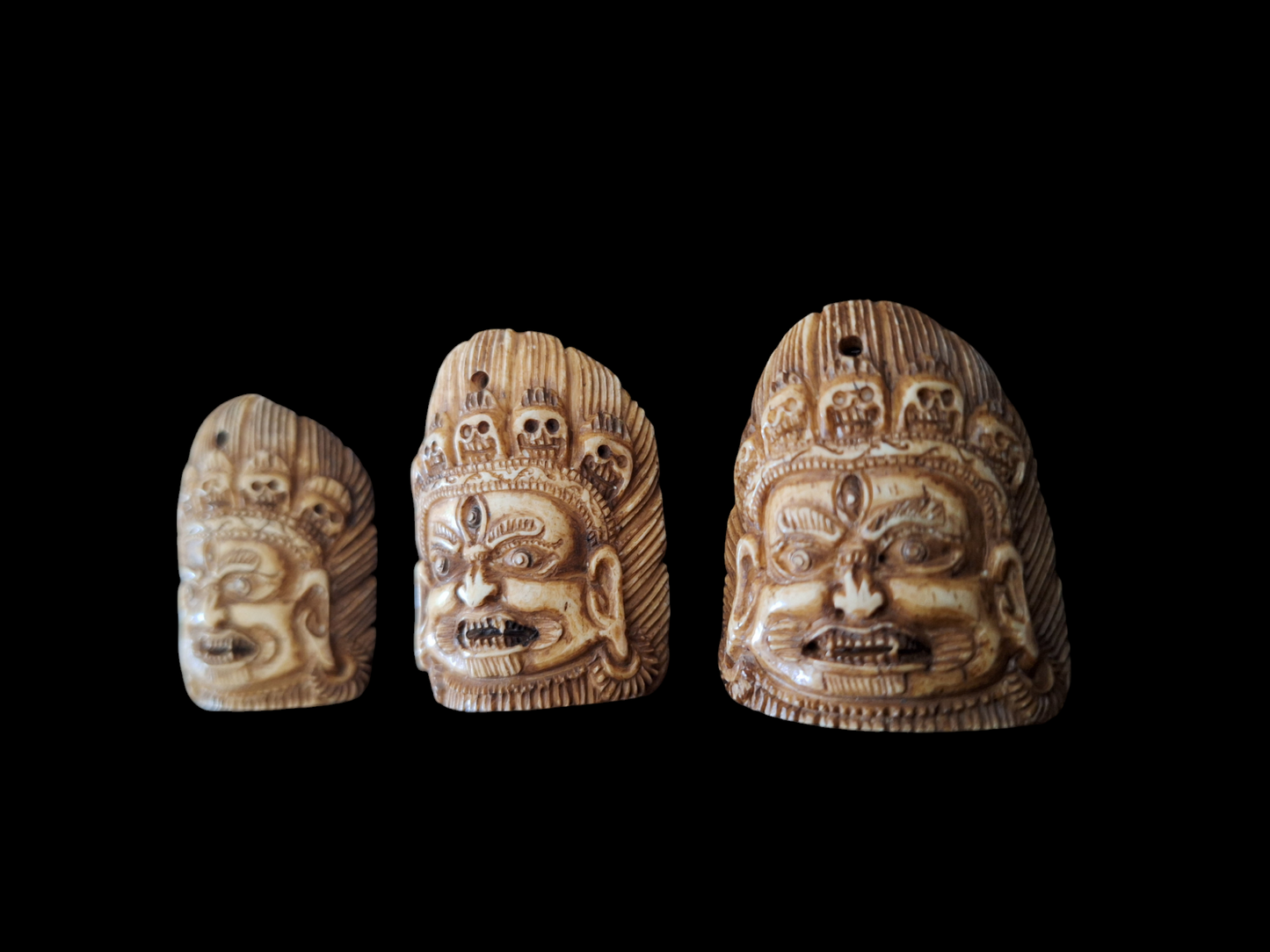 Bone carved Mahakala pendant #1