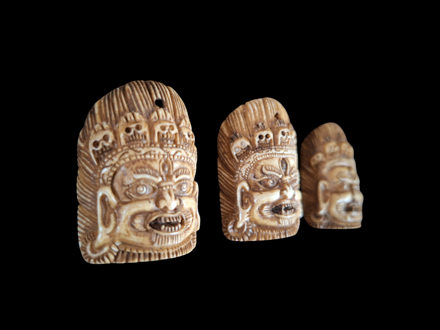 Bone carved Mahakala pendant #1