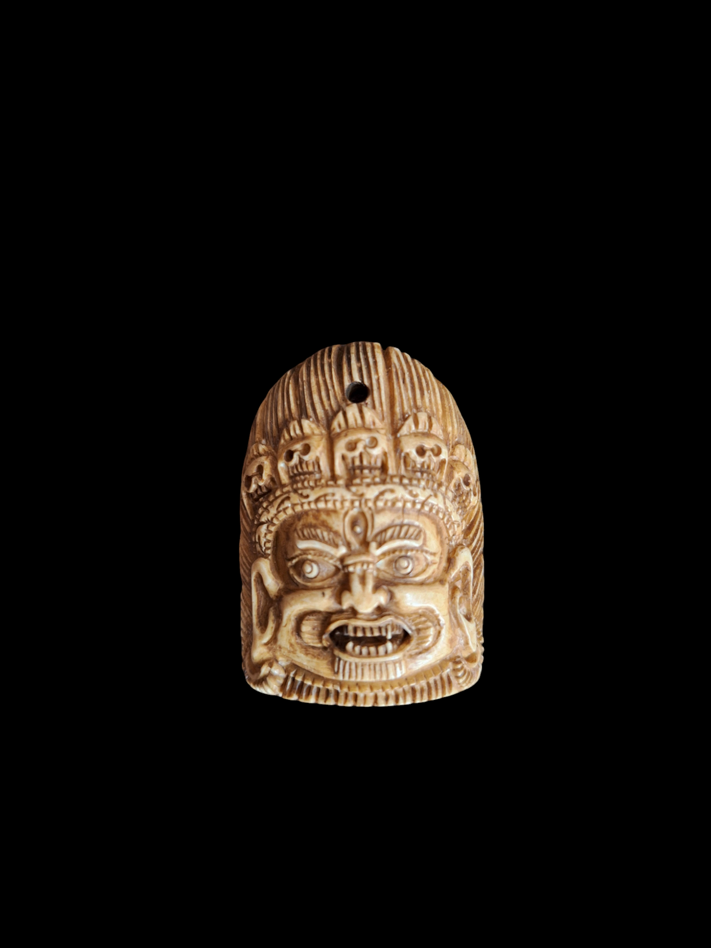 Bone carved Mahakala pendant #1