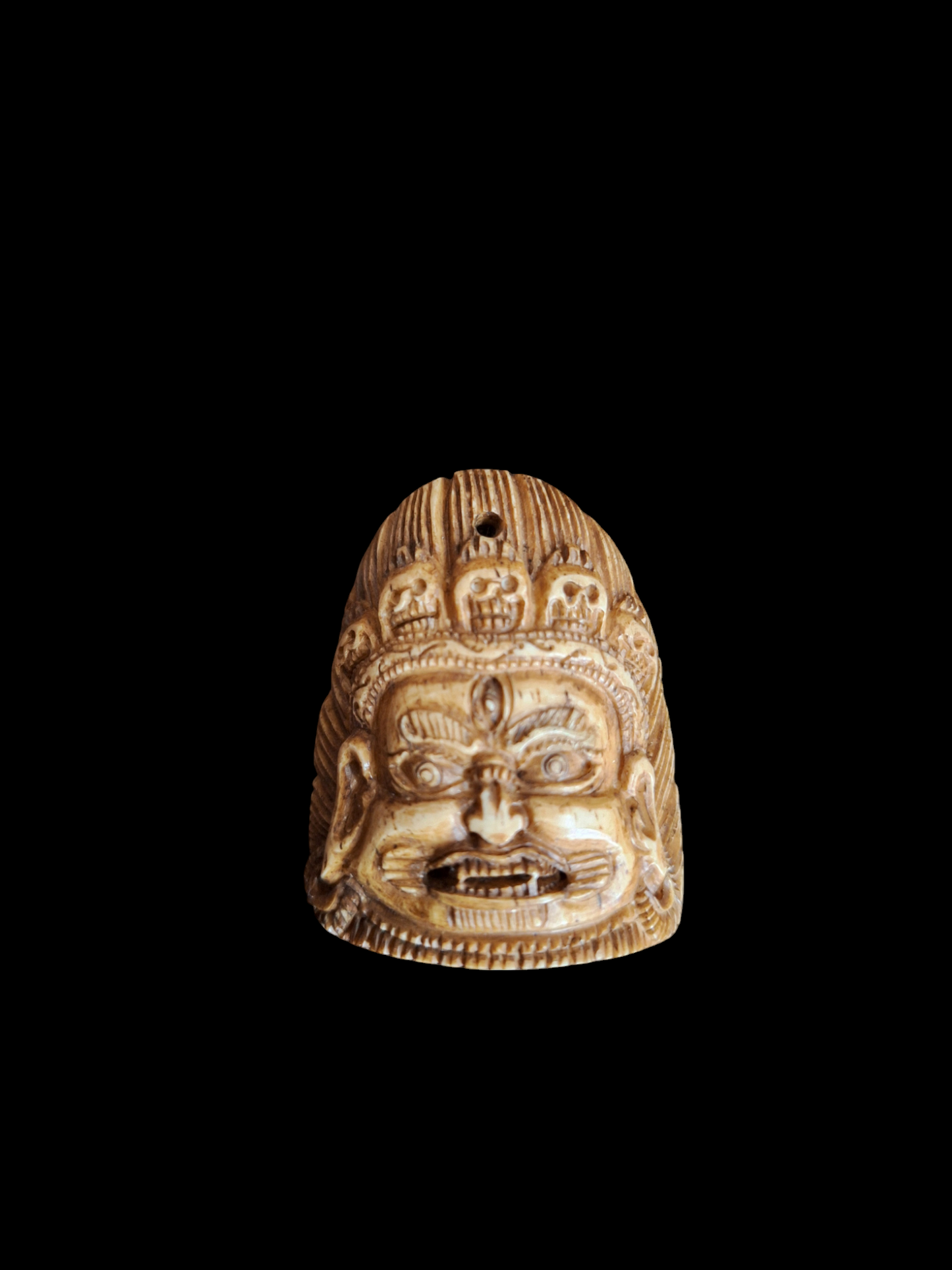 Bone carved Mahakala pendant #1
