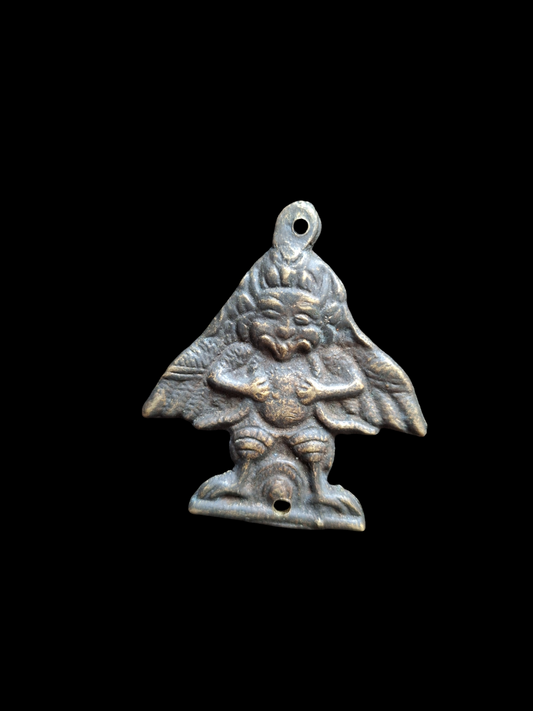 Old bronze pendant Garuda