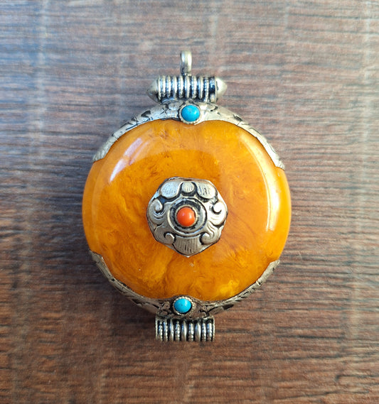 Tibetan silver and beeswax amber pendant