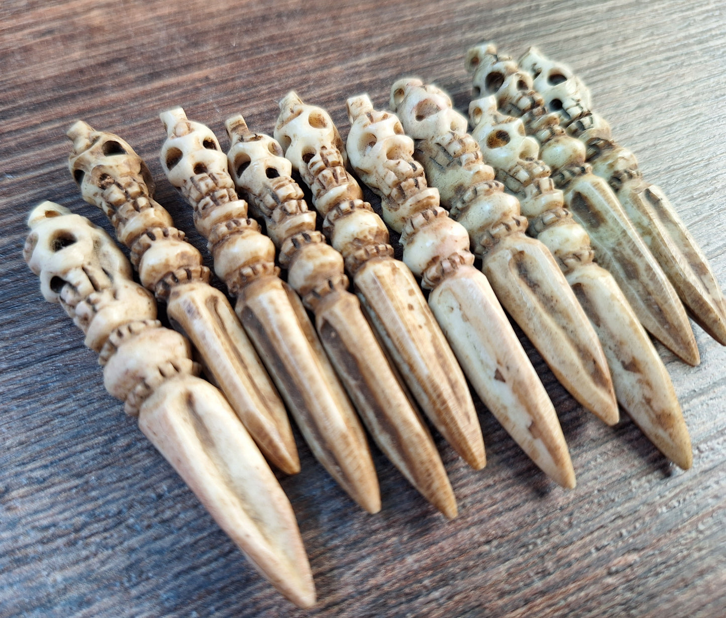 Vintage bone carved phurba pendant