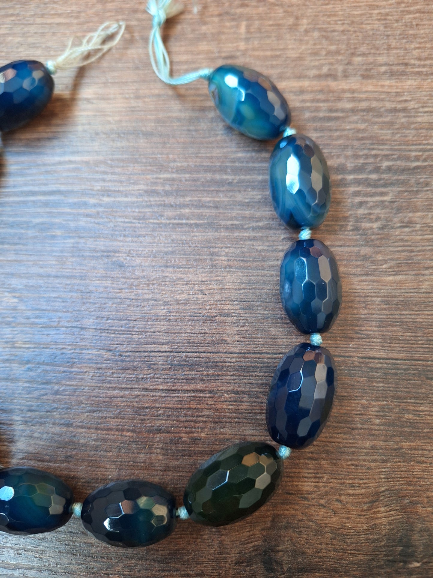 Faceted blue agate bead strand