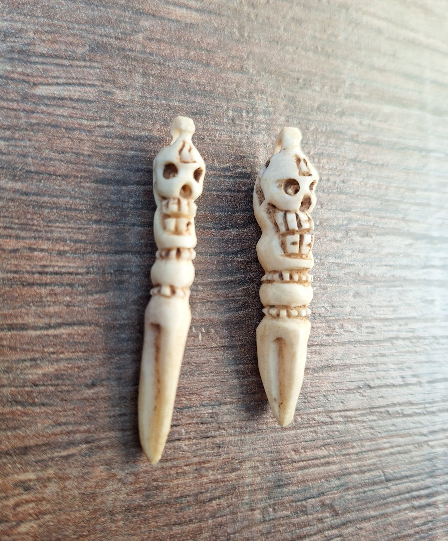 Vintage bone carved phurba pendant