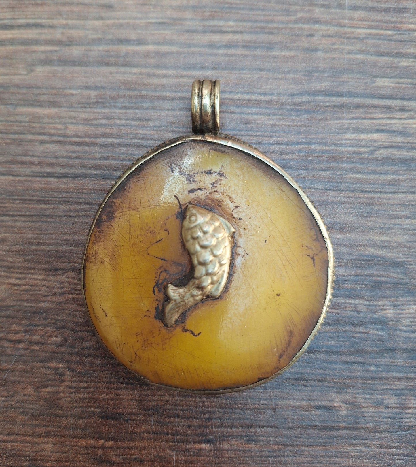 Vintage Tibetan silver and copal pendant