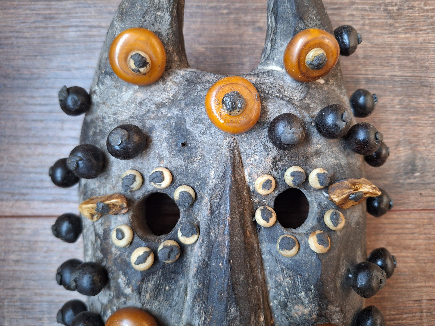 Old Nepalese wooden mask with rita, copal and shell beads