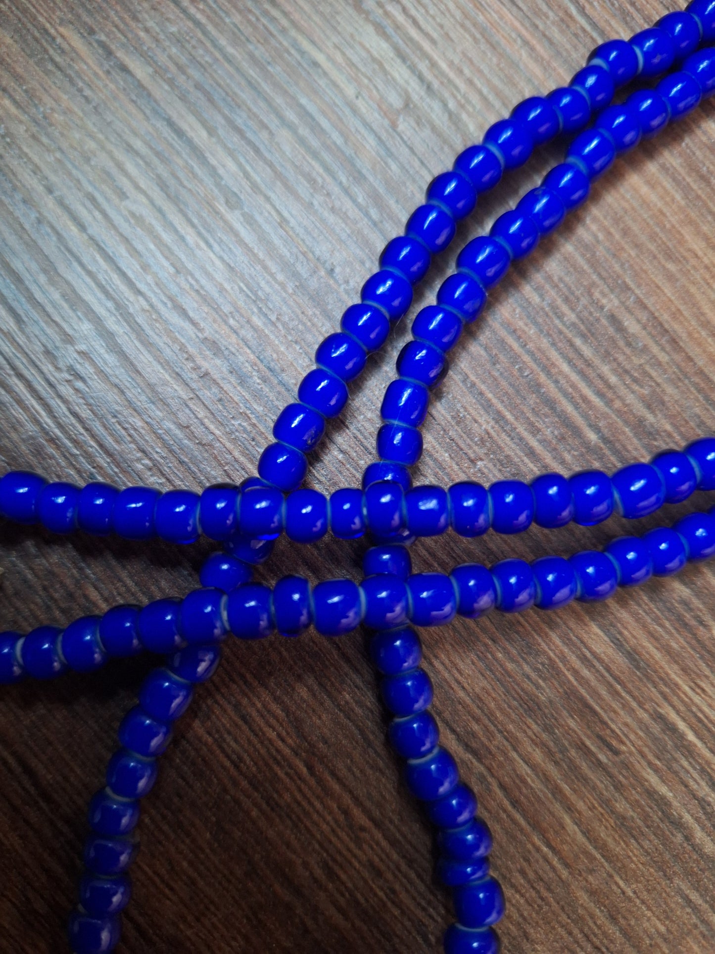 Blue glass bead strand