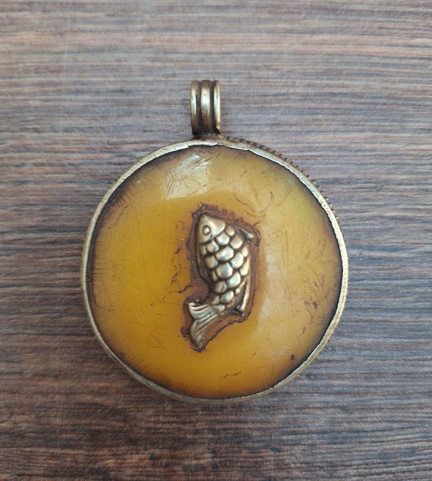 Vintage Tibetan silver and copal pendant