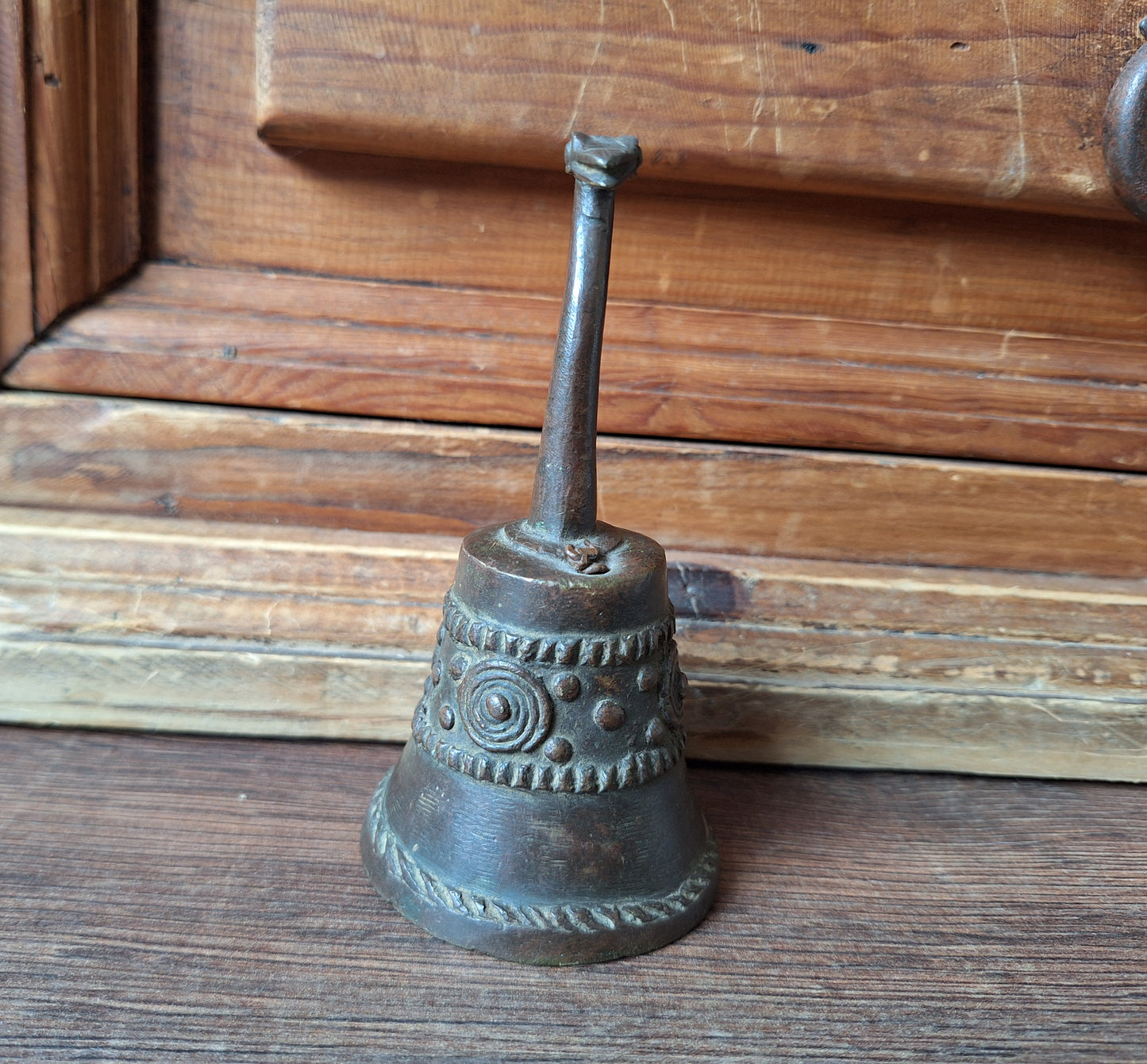 Vintage bronze altar bell with snake