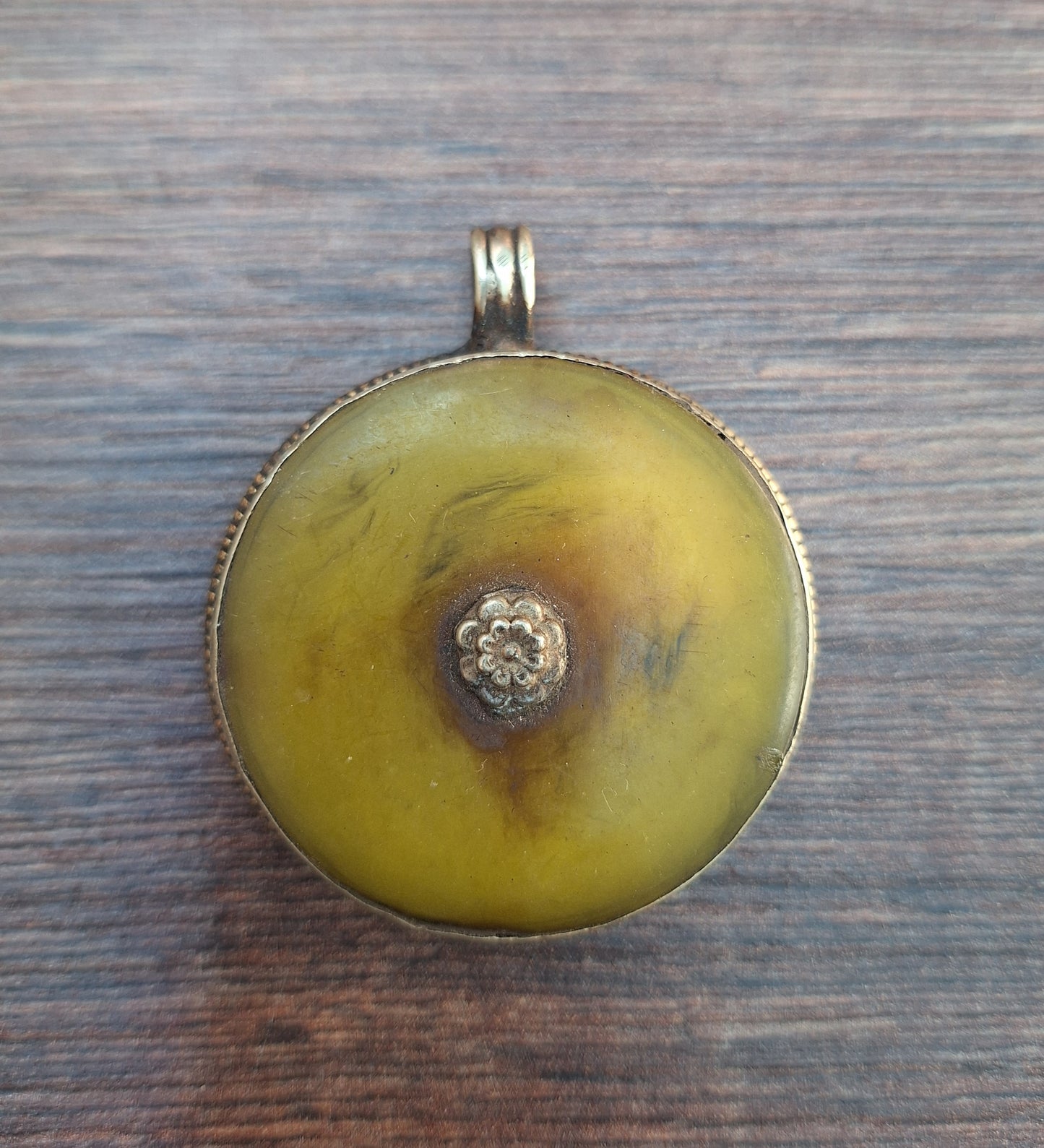 Vintage Tibetan silver and copal pendant