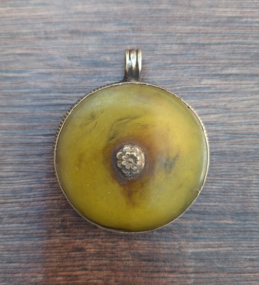 Vintage Tibetan silver and copal pendant