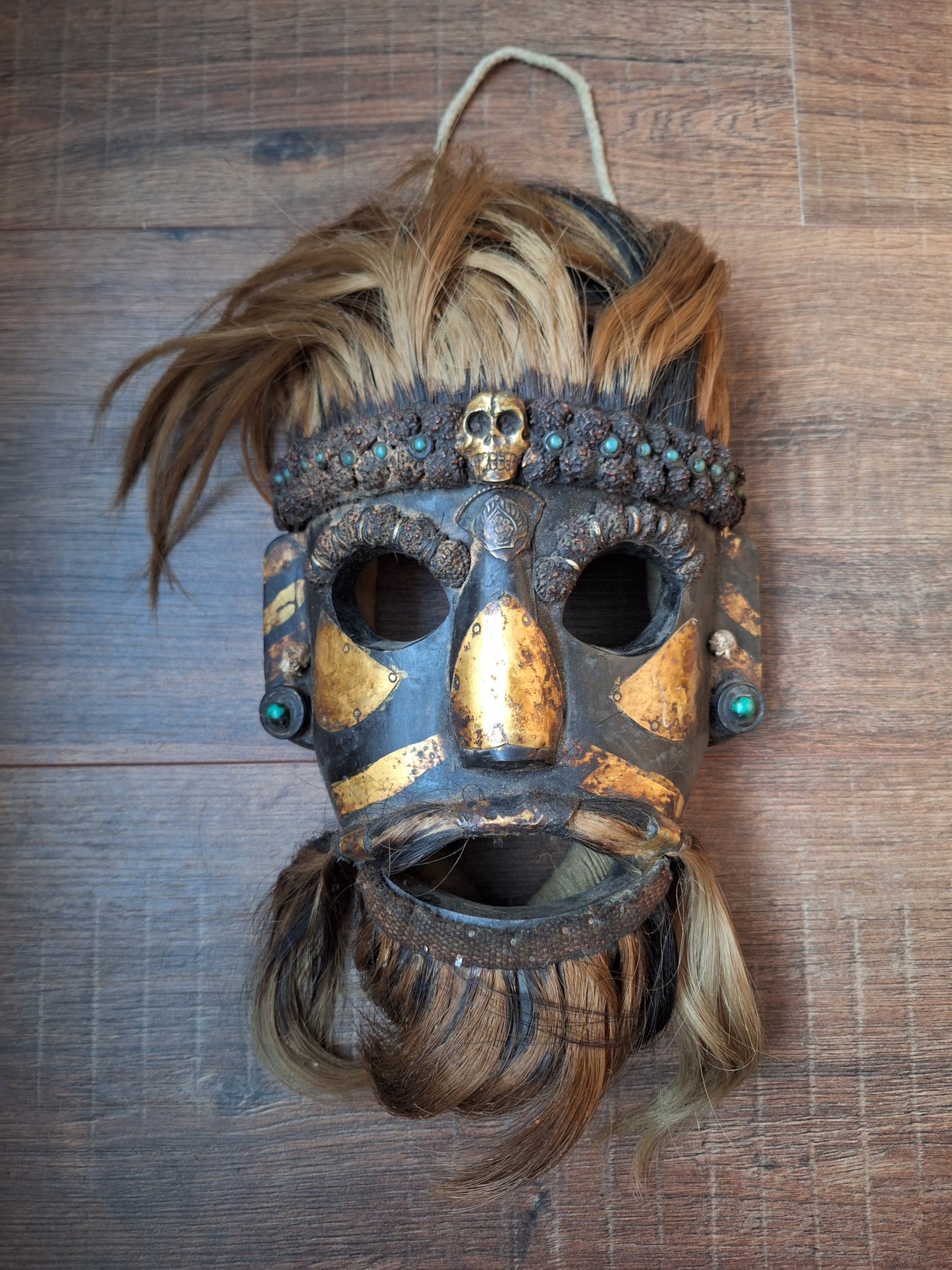 Vintage wooden wrathful spirit mask with metal plating, beads and yak hair