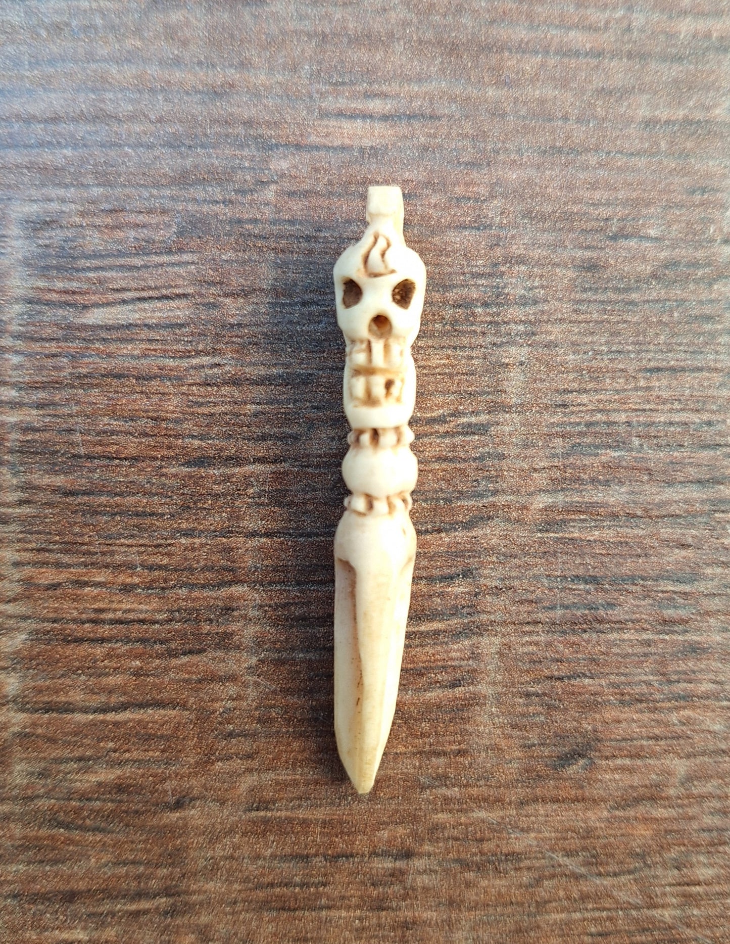 Vintage bone carved phurba pendant