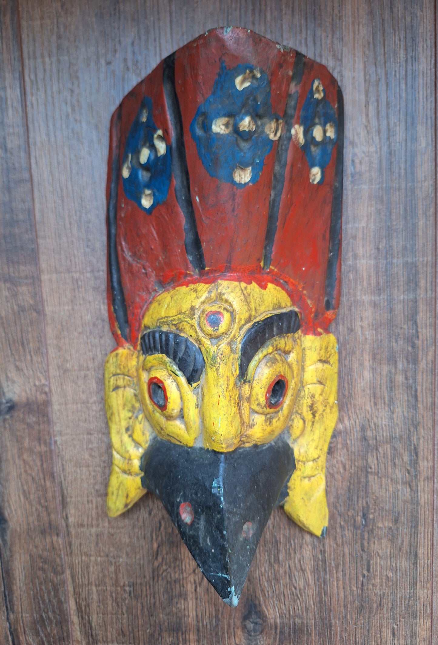 Vintage wooden Garuda mask