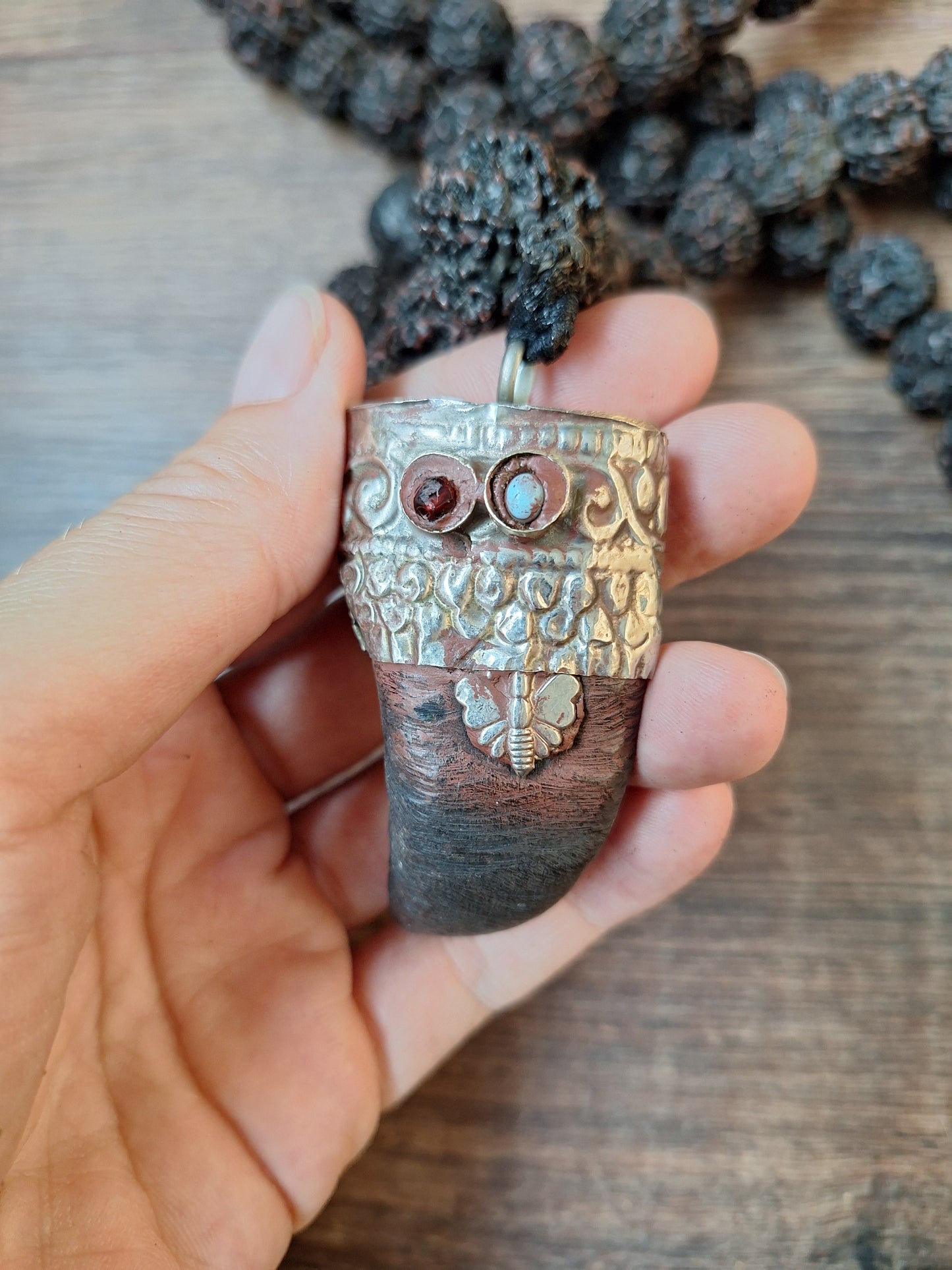 Vintage Nepalese rudraksha mala with horn pendant