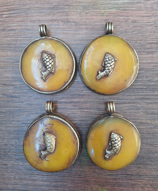 Vintage Tibetan silver and copal pendant