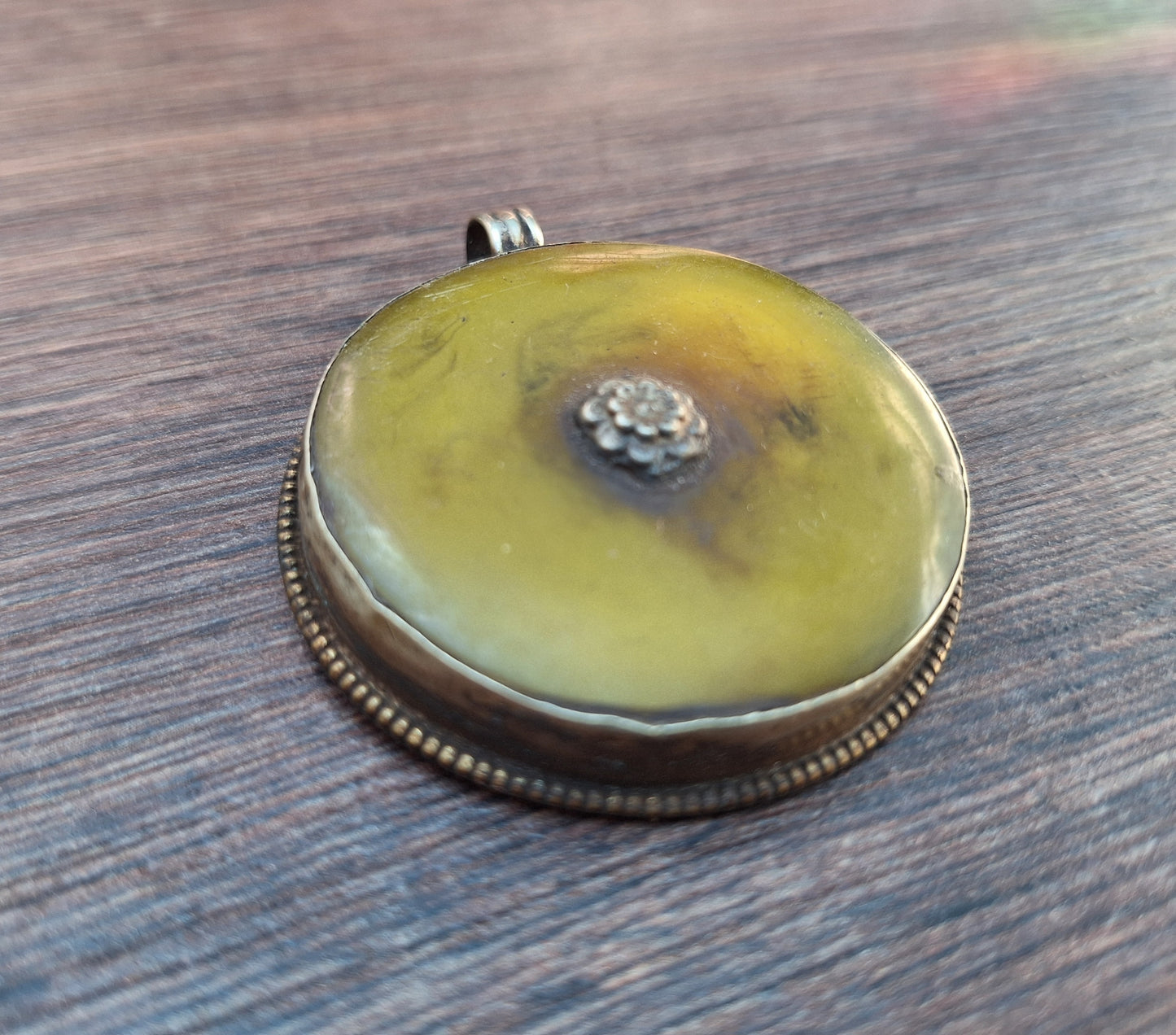 Vintage Tibetan silver and copal pendant