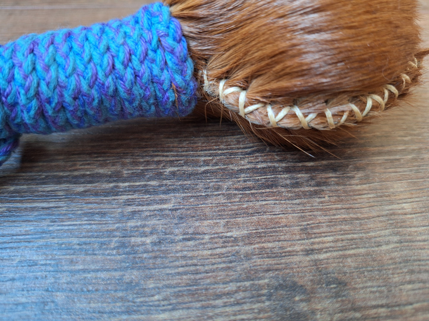 Horse hide and elder wood rattle