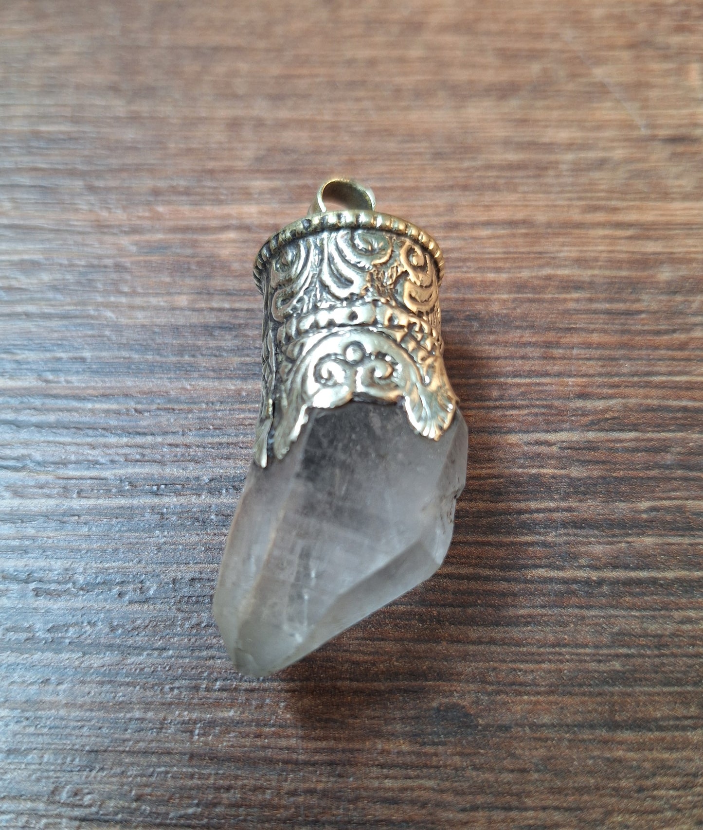 Vintage quartz crystal in Tibetan silver pendant