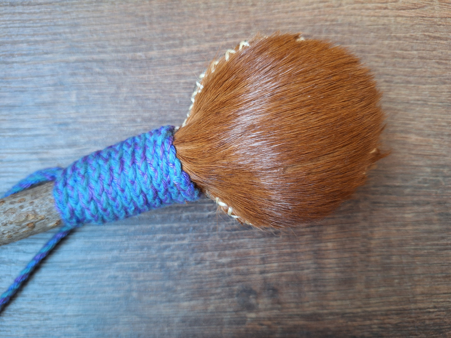 Horse hide and elder wood rattle