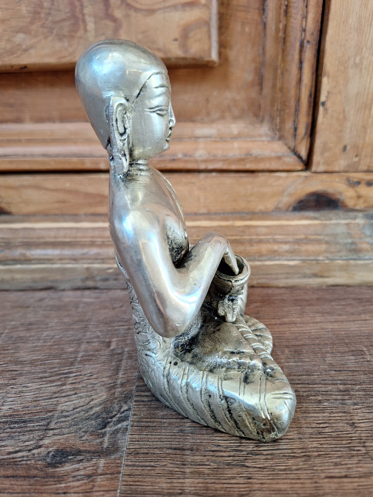 Vintage white metal Shakyamuni Buddha statue