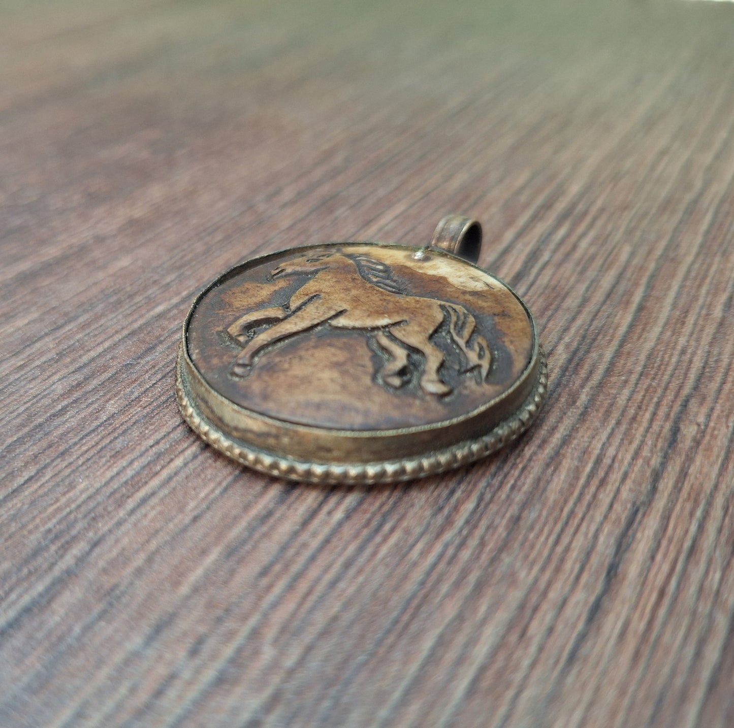 Vintage yak bone pendant Horse