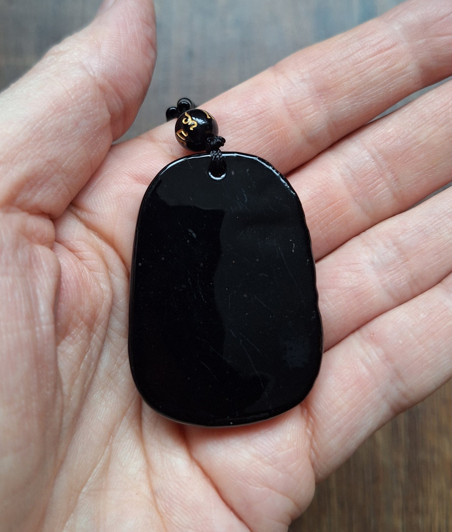 Black glass necklace with Dragon pendant