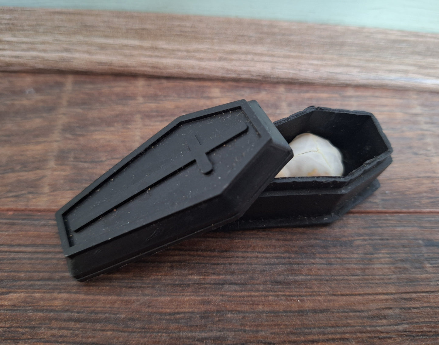 Mole skull in coffin