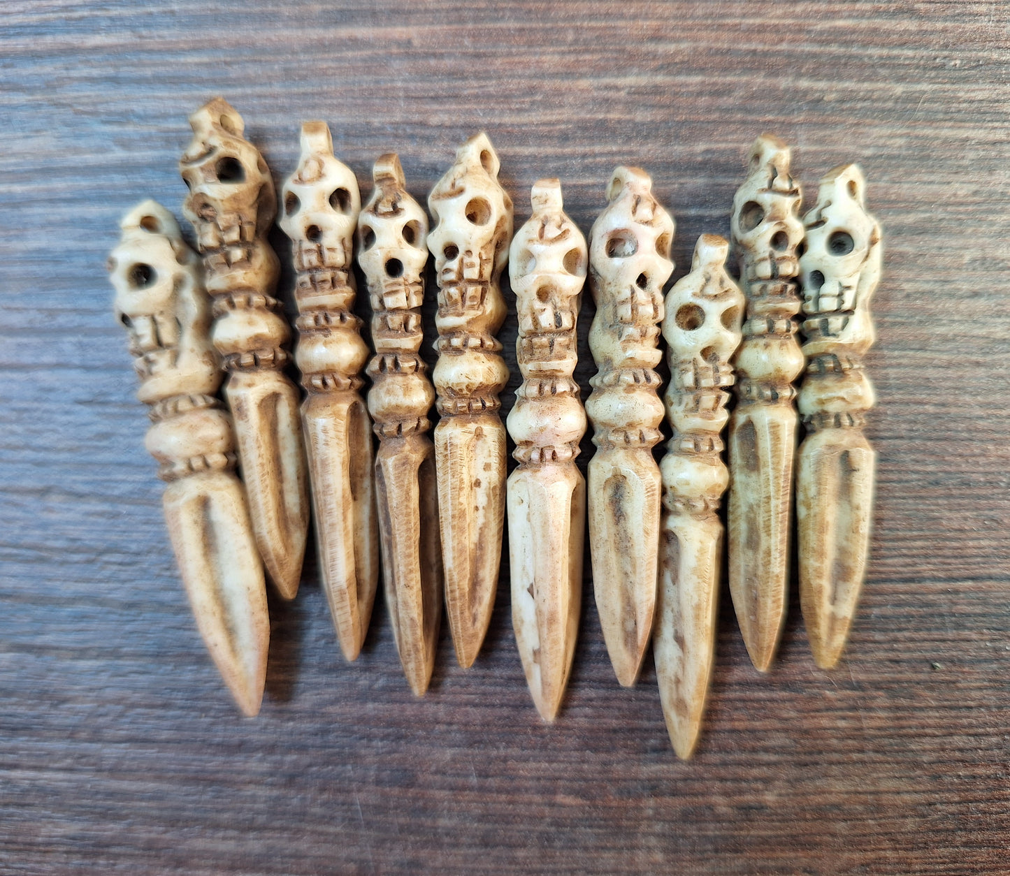 Vintage bone carved phurba pendant