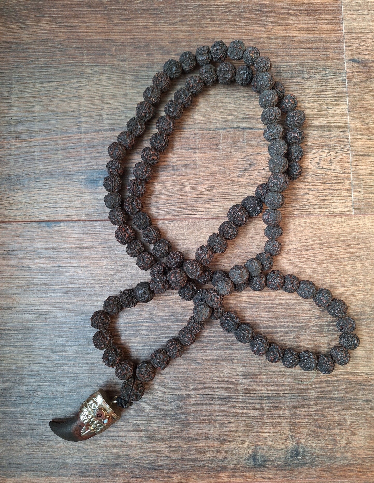 Vintage Nepalese rudraksha mala with horn pendant