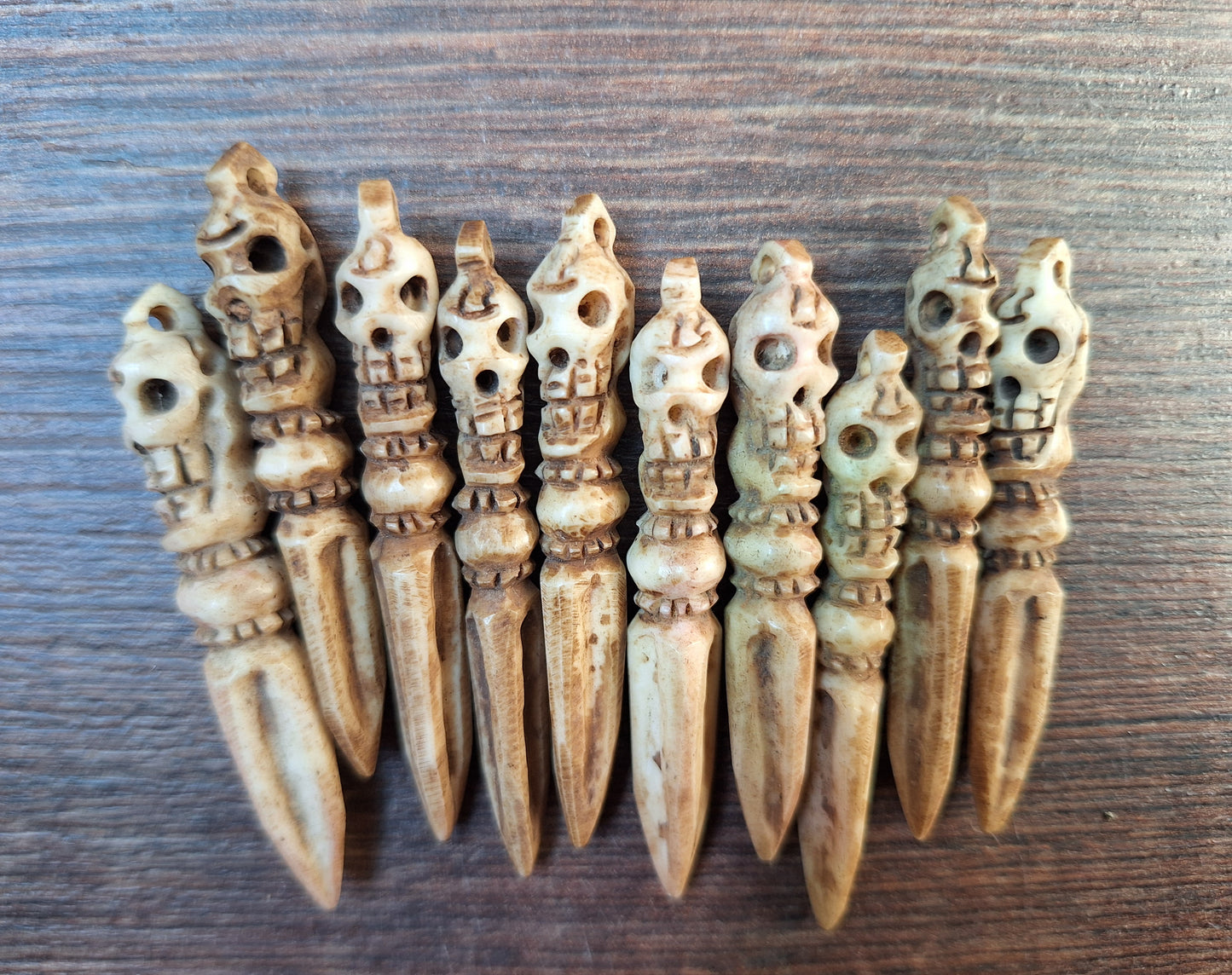 Vintage bone carved phurba pendant