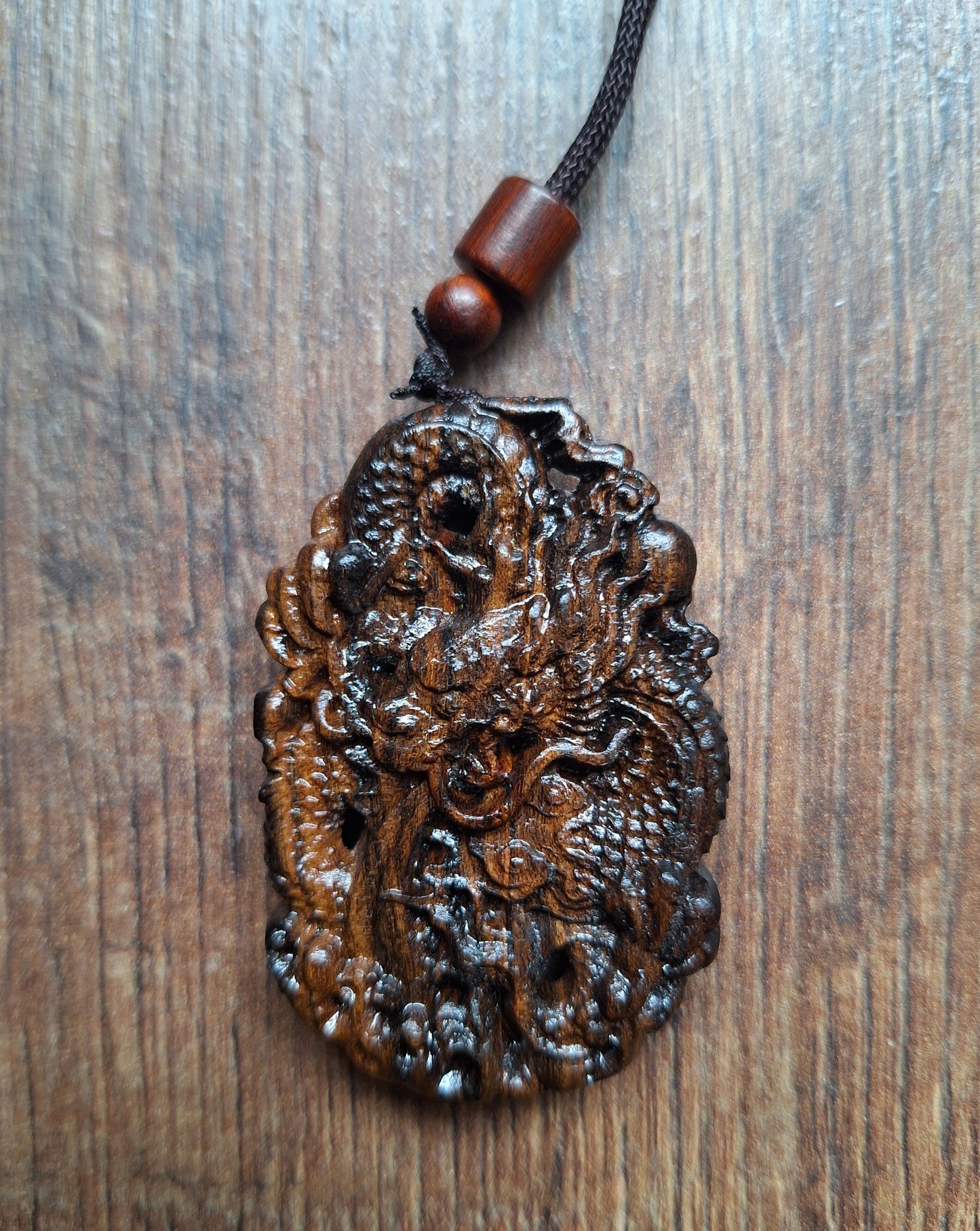 Necklace with wooden pendant Dragon